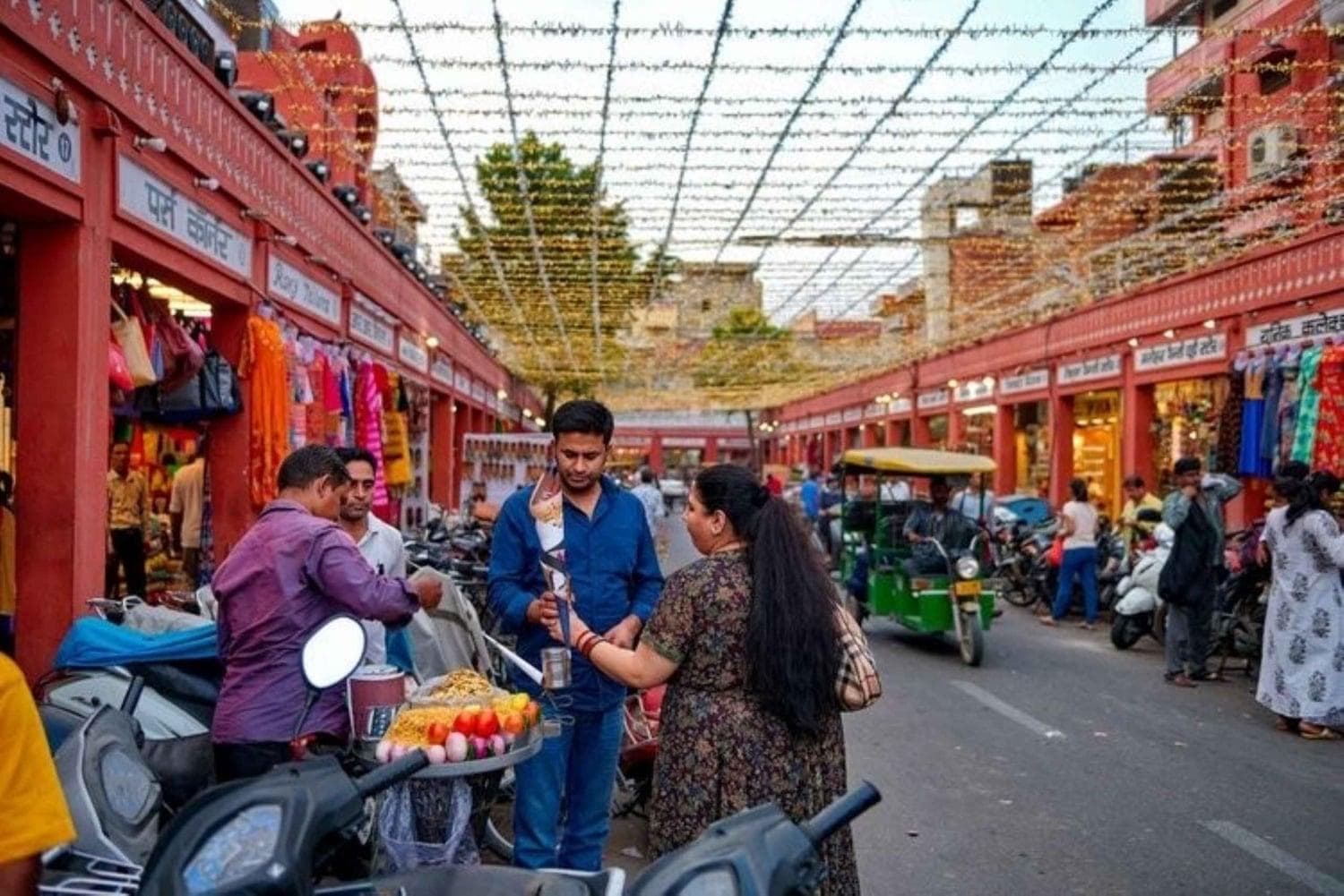 A spread of Jaipur street food including kachori, chaat and lassi